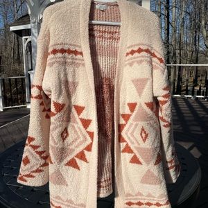 Super soft sweater tan background